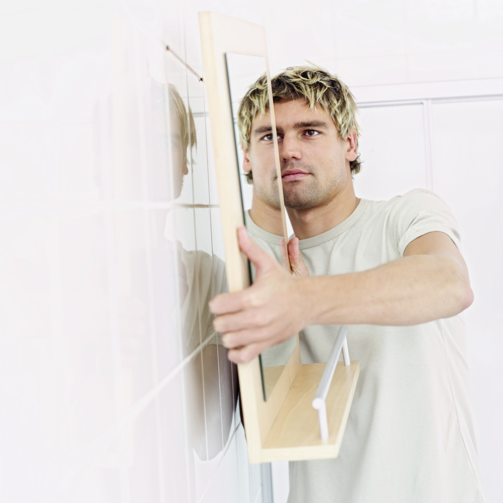 How to Attach a Mirror to a Tile Wall