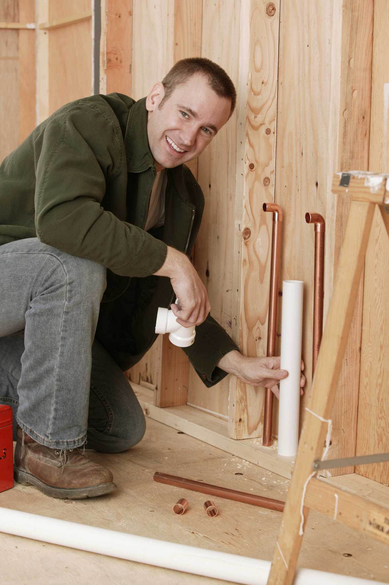 How to Attach a Washing Machine & Kitchen Sink to One Vent