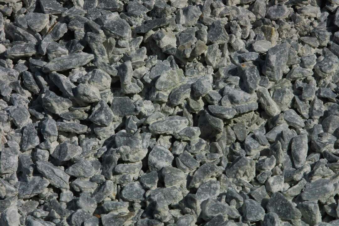 How to Break Up a Packed Gravel Driveway
