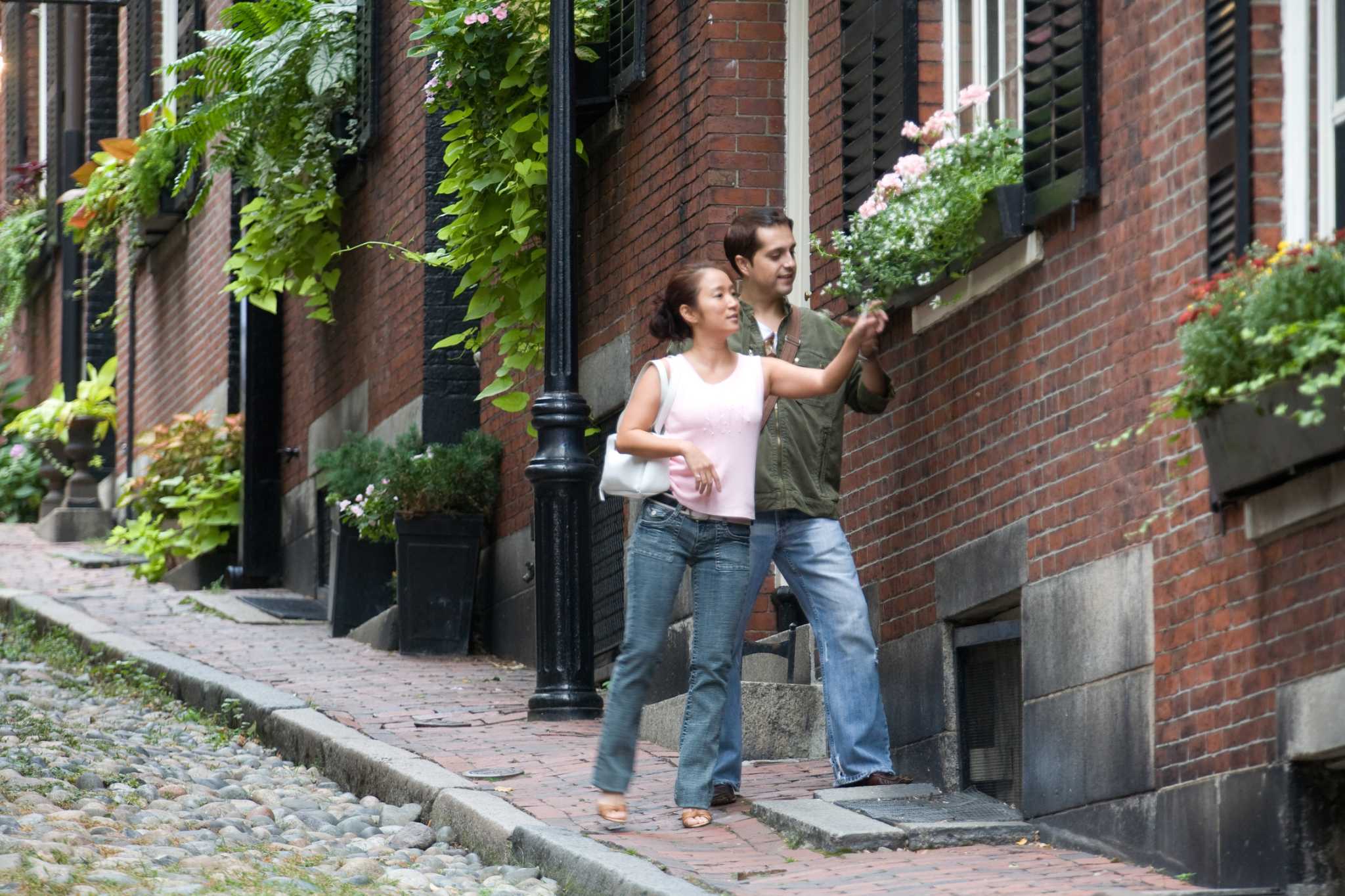 How to Hang a Flower Box on a Brick Home