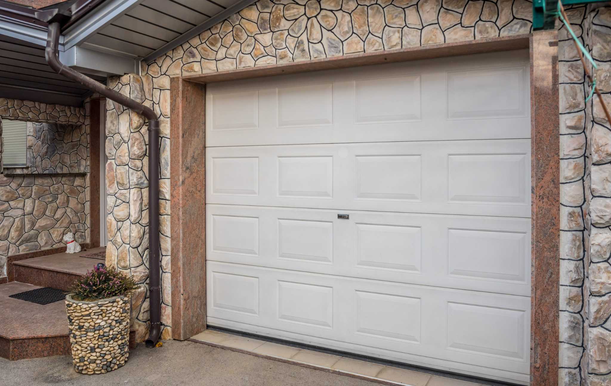 How to Fix a Garage Door That Gets Stuck Halfway