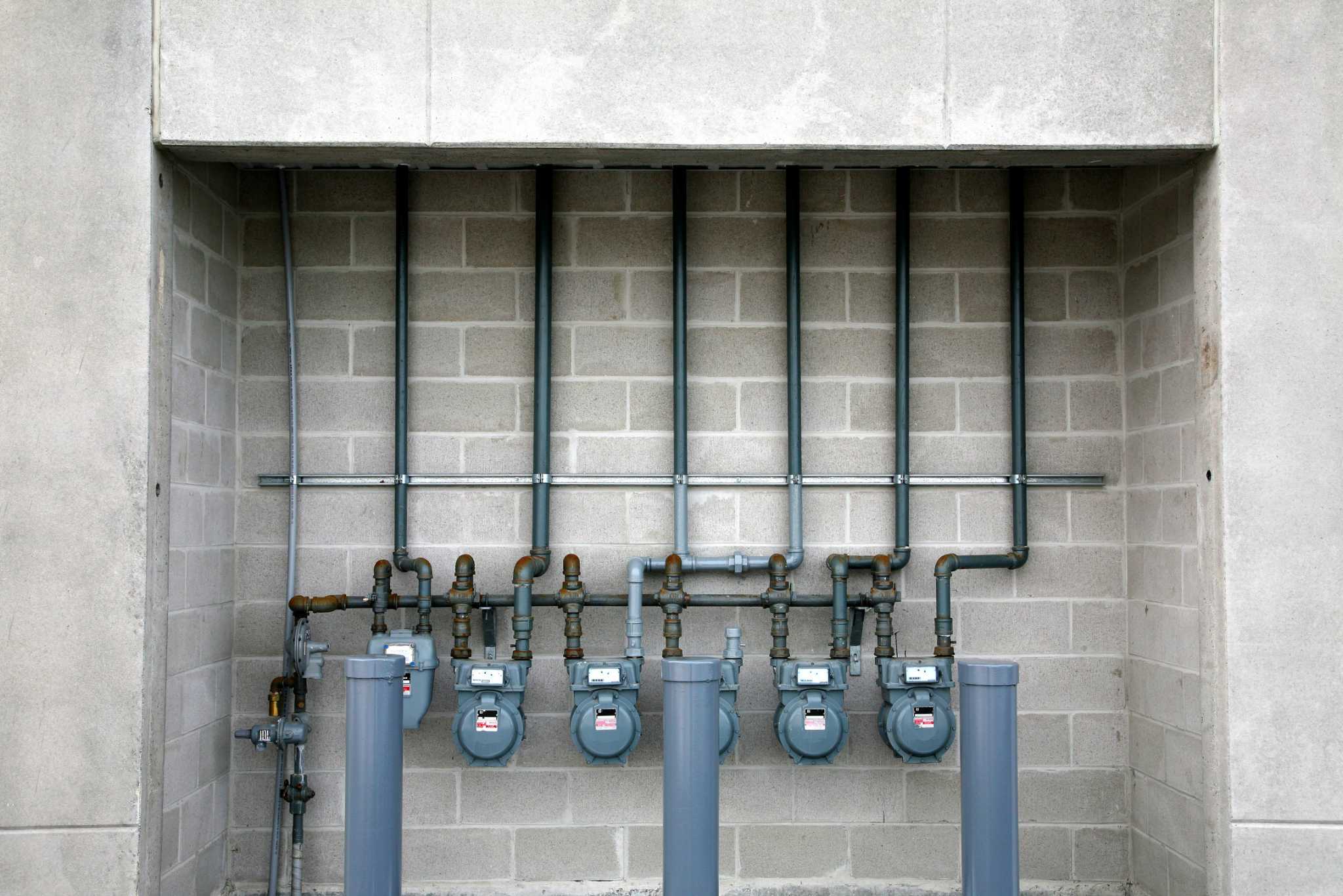 How to Fix a Hole Around a Pipe in a Cinder Block Wall