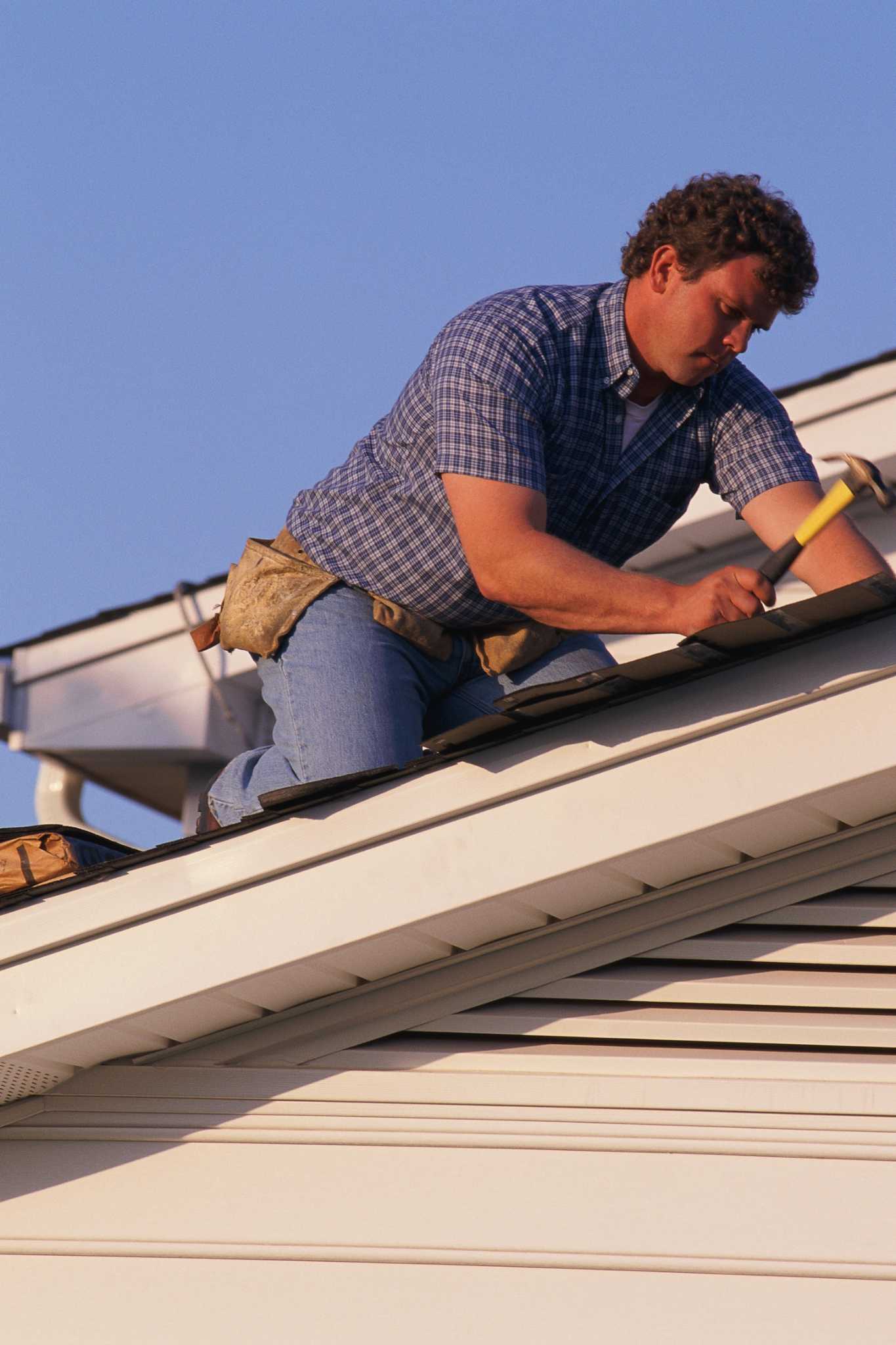 How to Fix Torn Roof Shingles