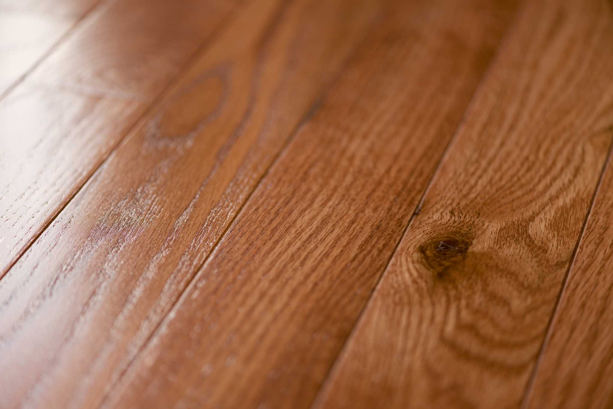 How to Fix Scratches on a Dark Wood Laminate Shiny Floor