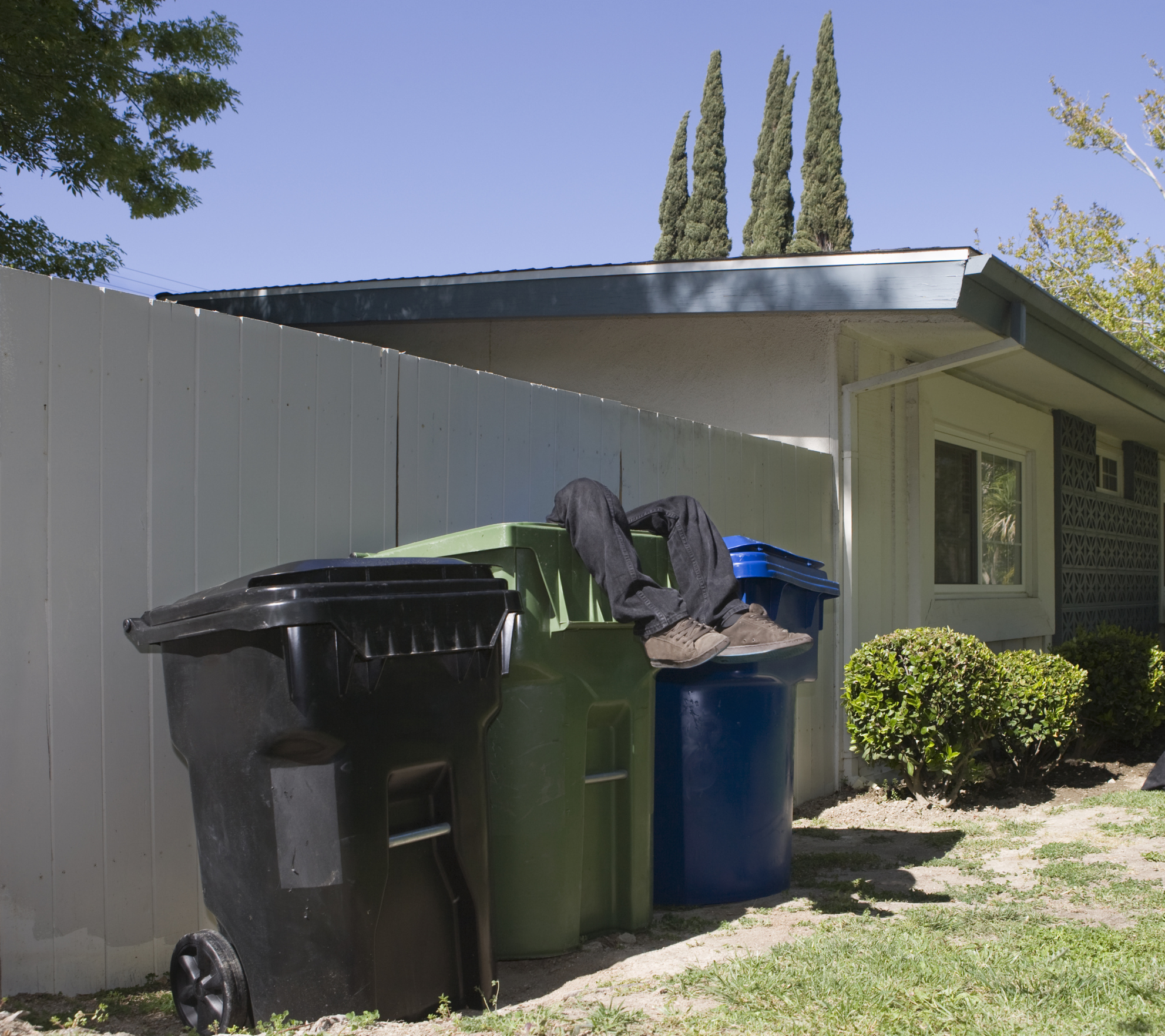 How to Build a Wood Fence to Hide Trash Bins