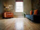 Water spots can dull hardwood flooring.