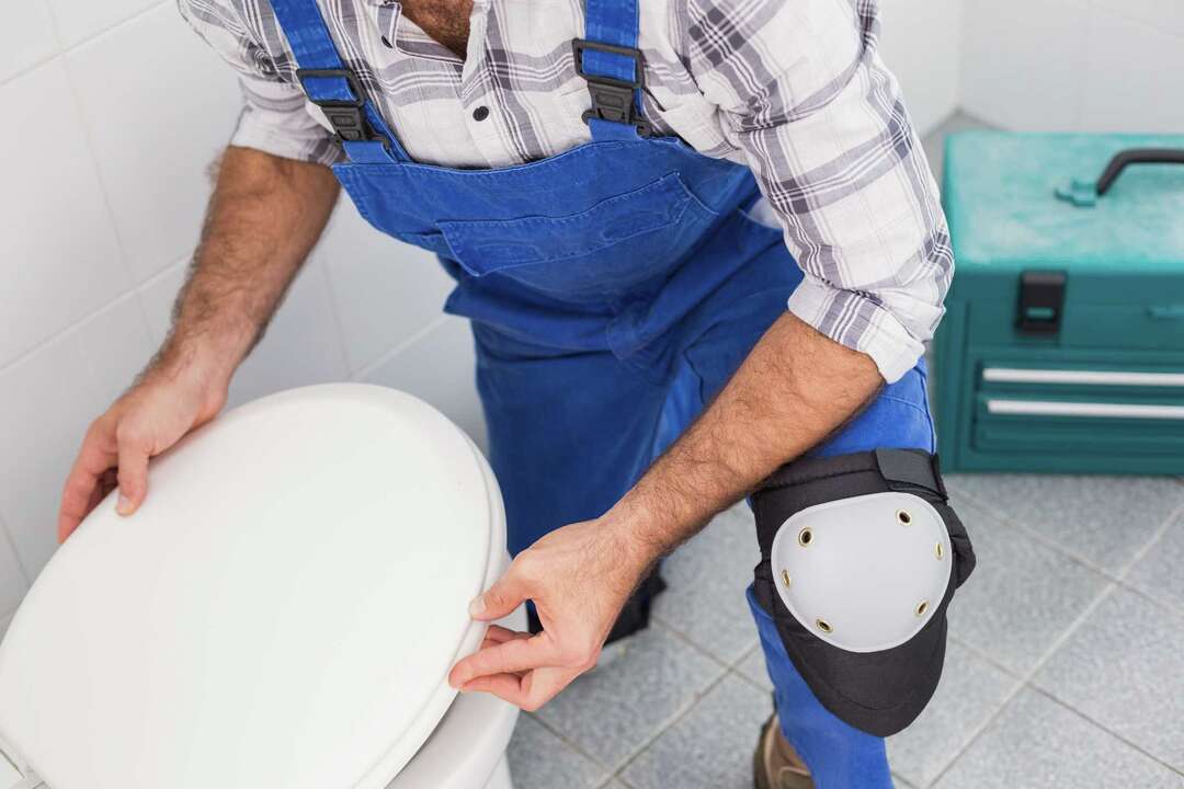 How to Raise a Toilet for Tile Installation