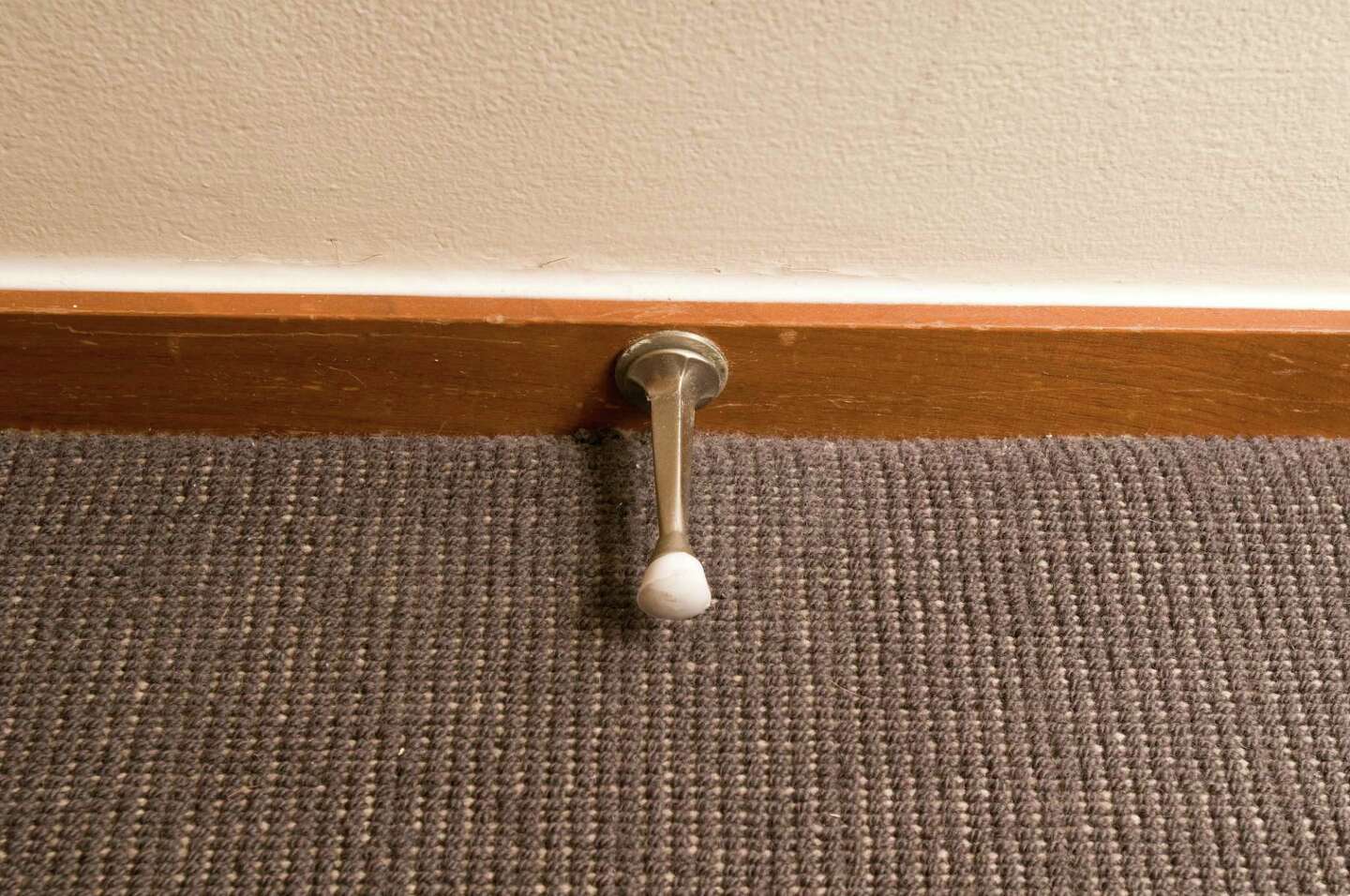 How to Find a Floor Joist Under the Carpet