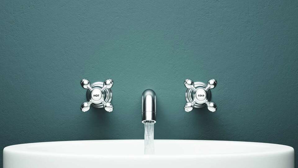 How To Fix a Garbage Disposal Backing Up Into the Other Sink