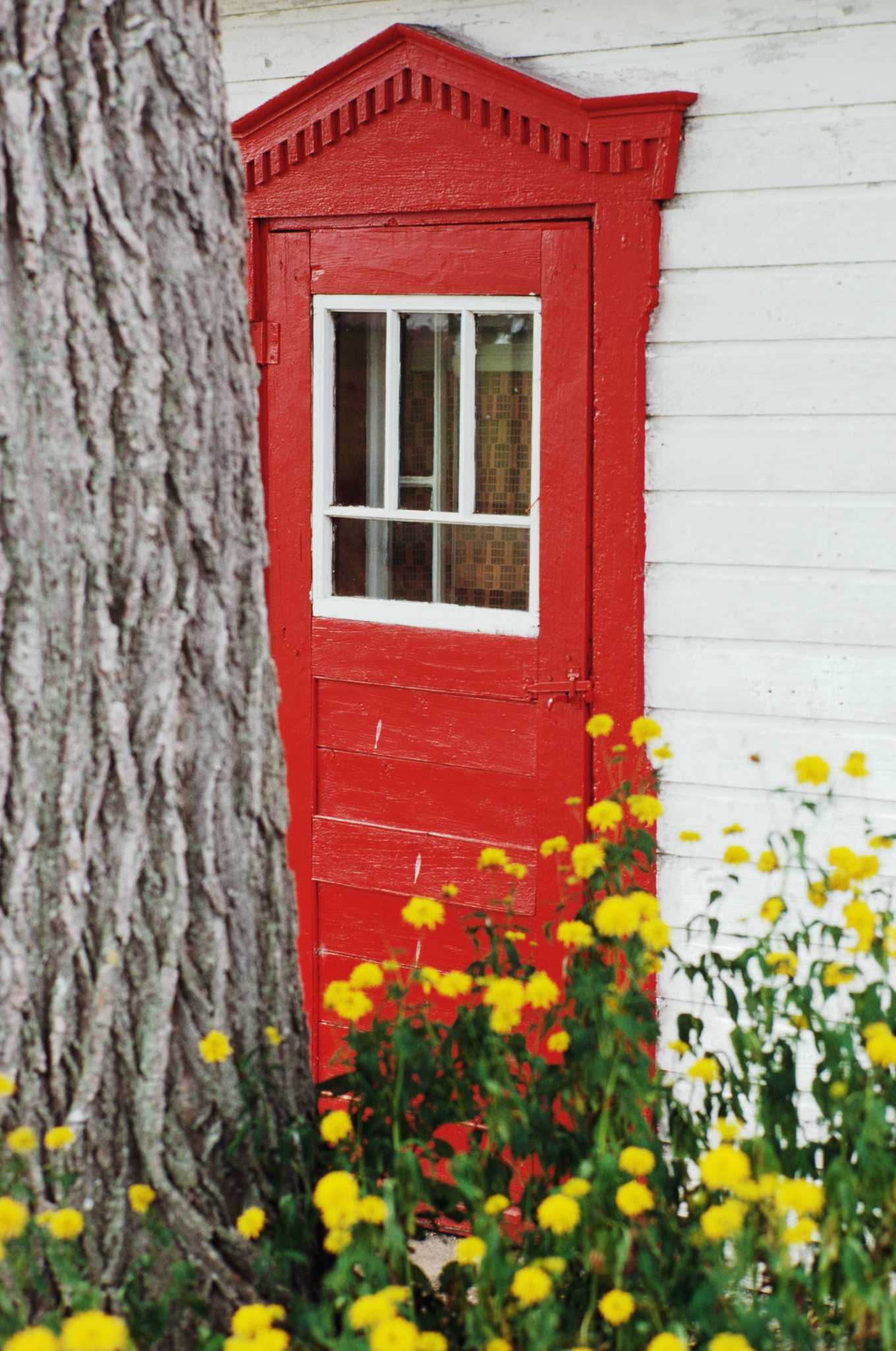 How to Hang a Curtain Rod on a Metal Door