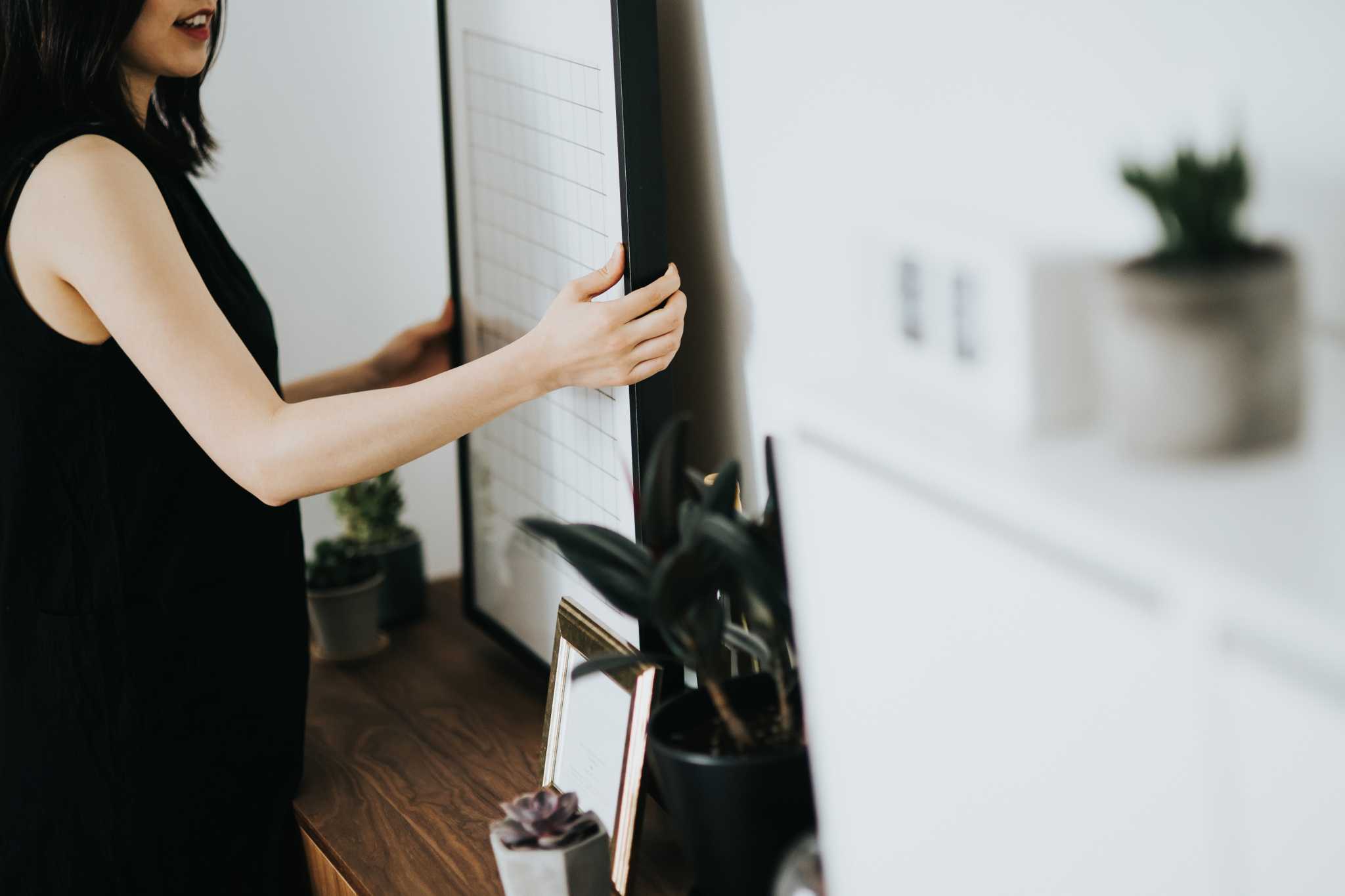 How to Hang Mirrors & Pictures on Plaster Walls Without Nails