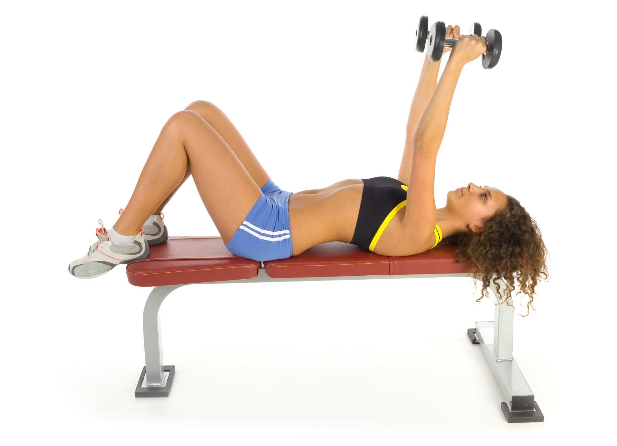 The Best Exercise Workouts With Dumbbells for a Woman's Chest