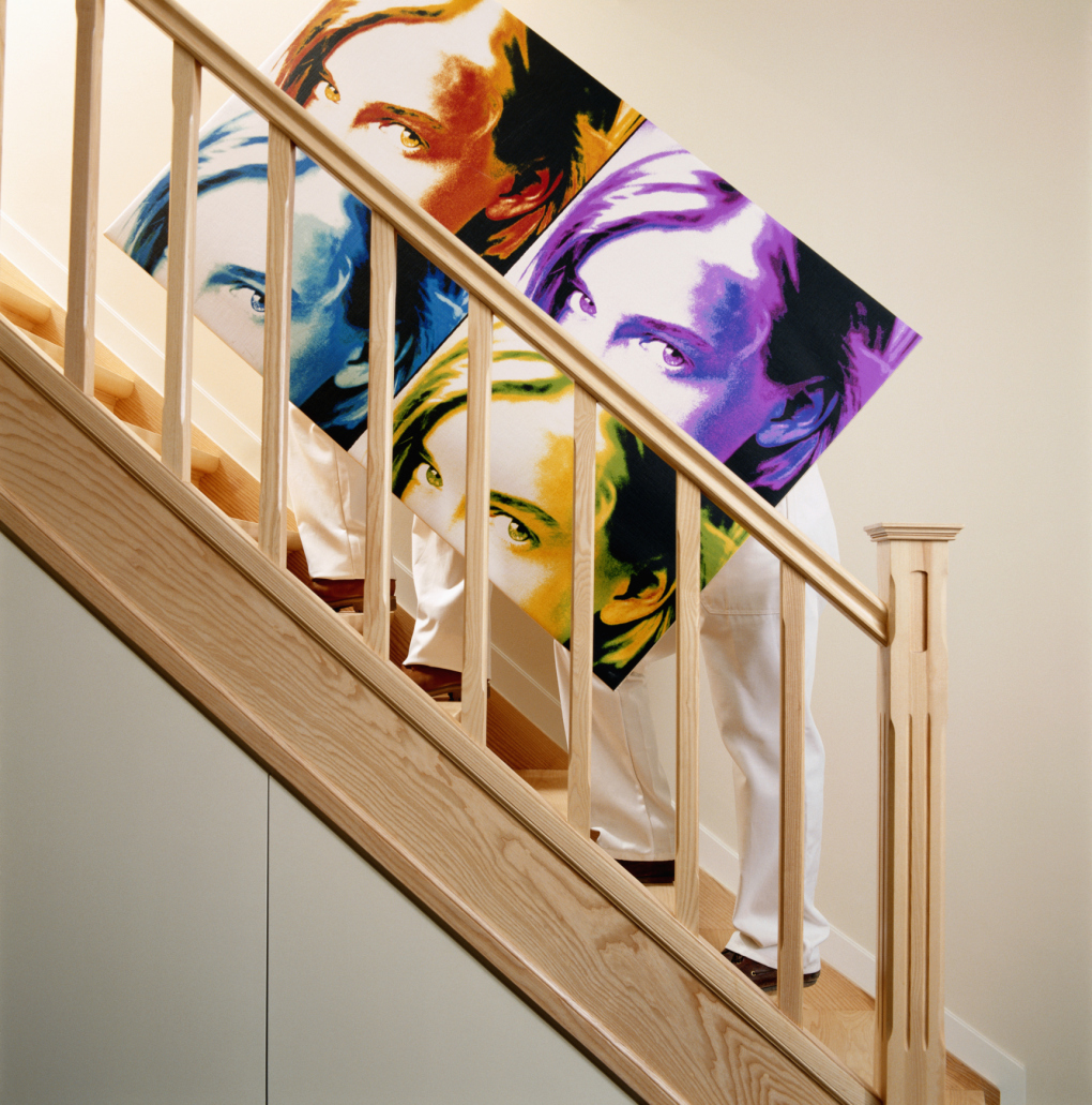 how-to-hang-wall-art-above-stairs