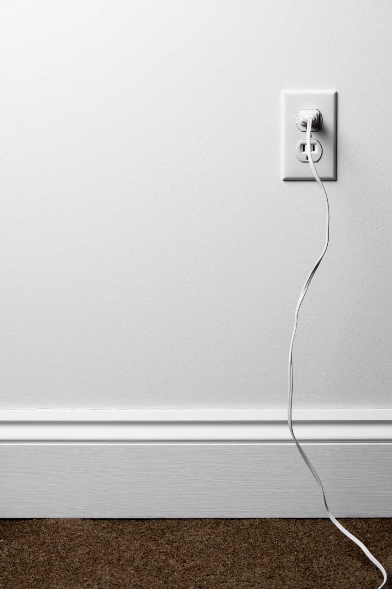 How to Hide Cords Against Baseboards