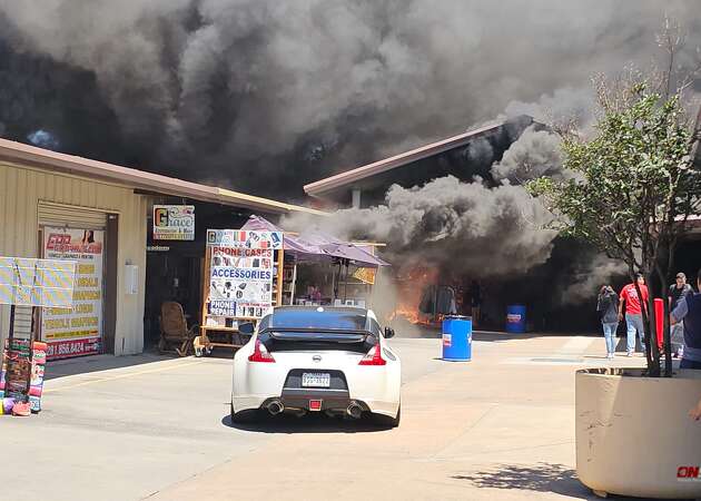 Story photo for Traders Village fire injures 2; flea market closes for the day as authorities investigate.