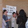 A group of parents gathered at the Plainview ISD Administration Office Monday morning for a protest.