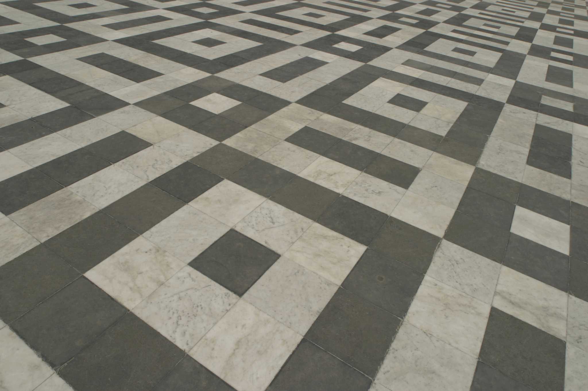 How to Remove Asphalt Tile Adhesive From a Concrete Floor