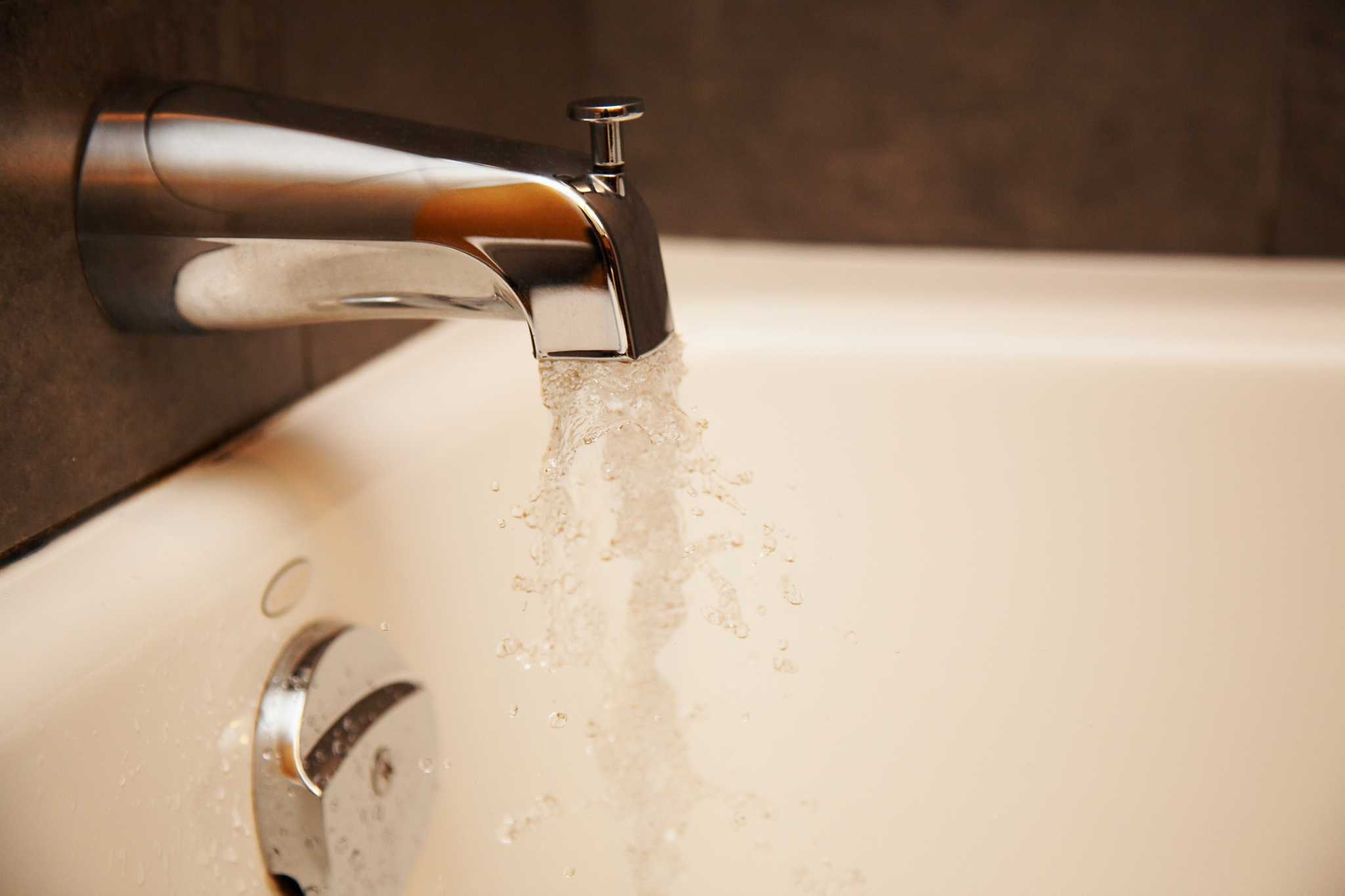 Tub Is Clogged & Fills Up When Using Bathroom Sink