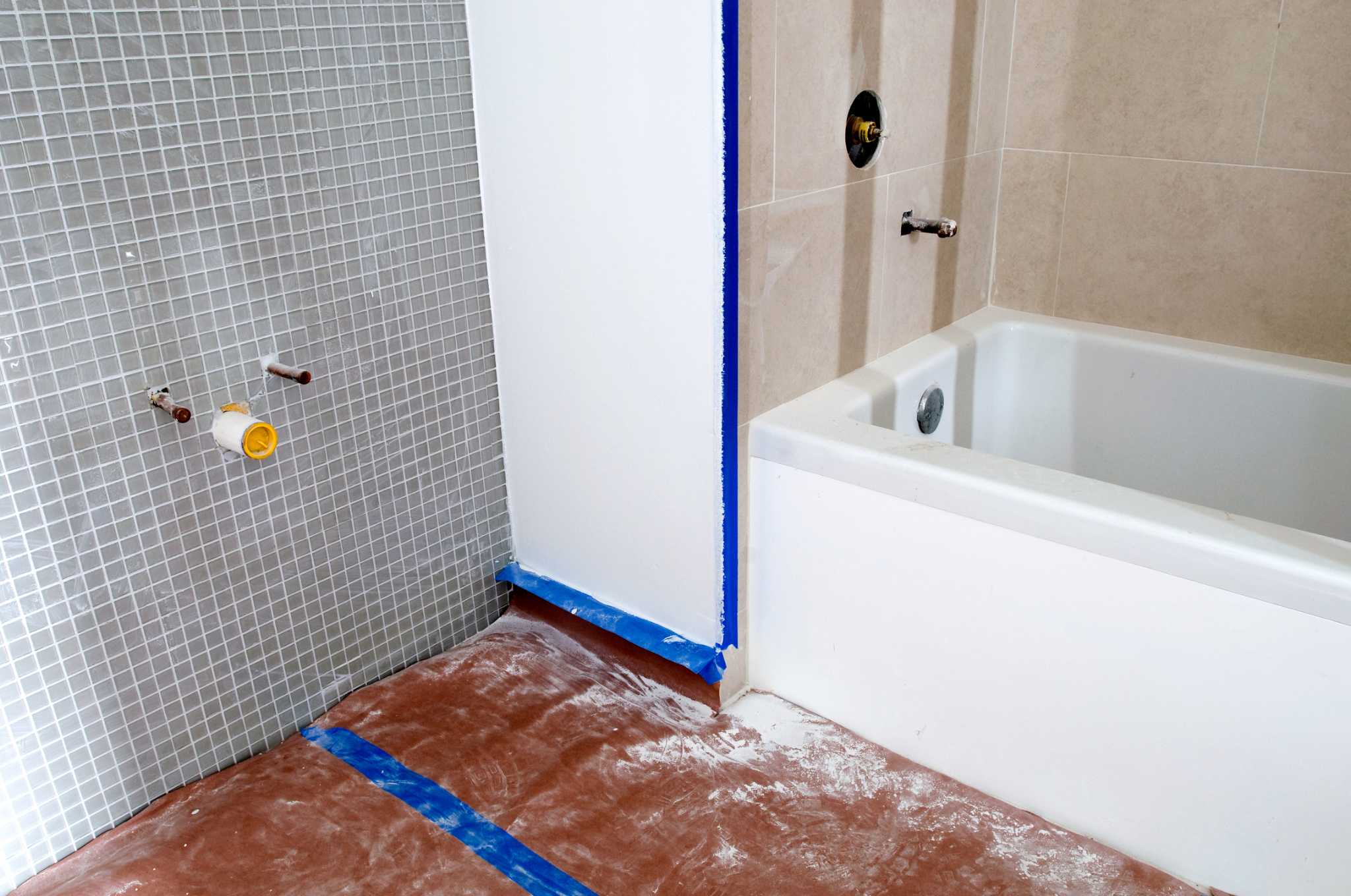 How to Install a Bathtub Drain When a Joist Is in the Way