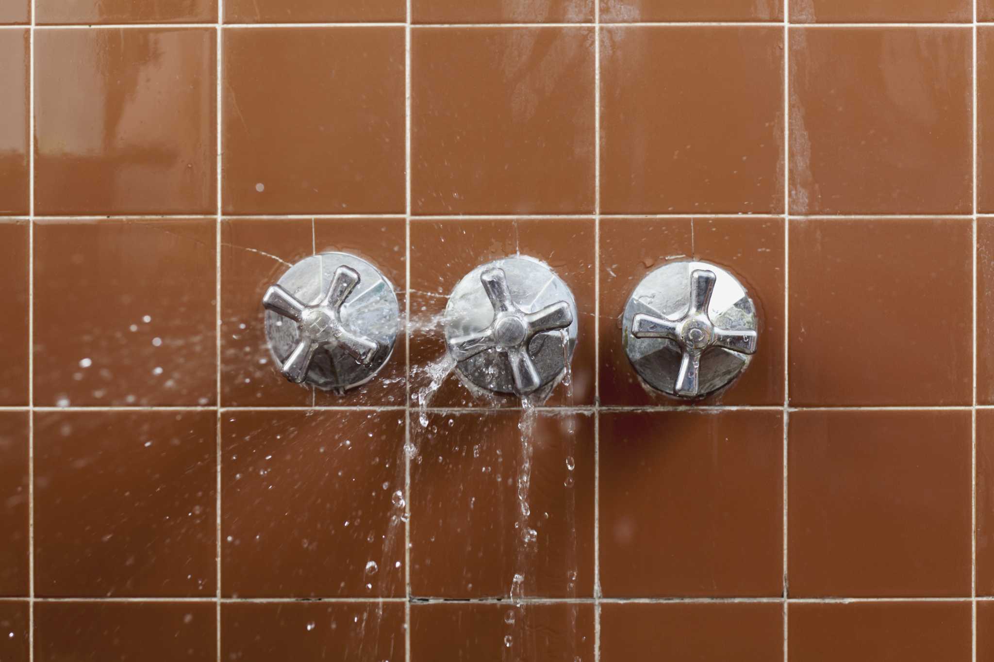 How to Repair a Leaky ThreeHandle Tub and Shower Faucet