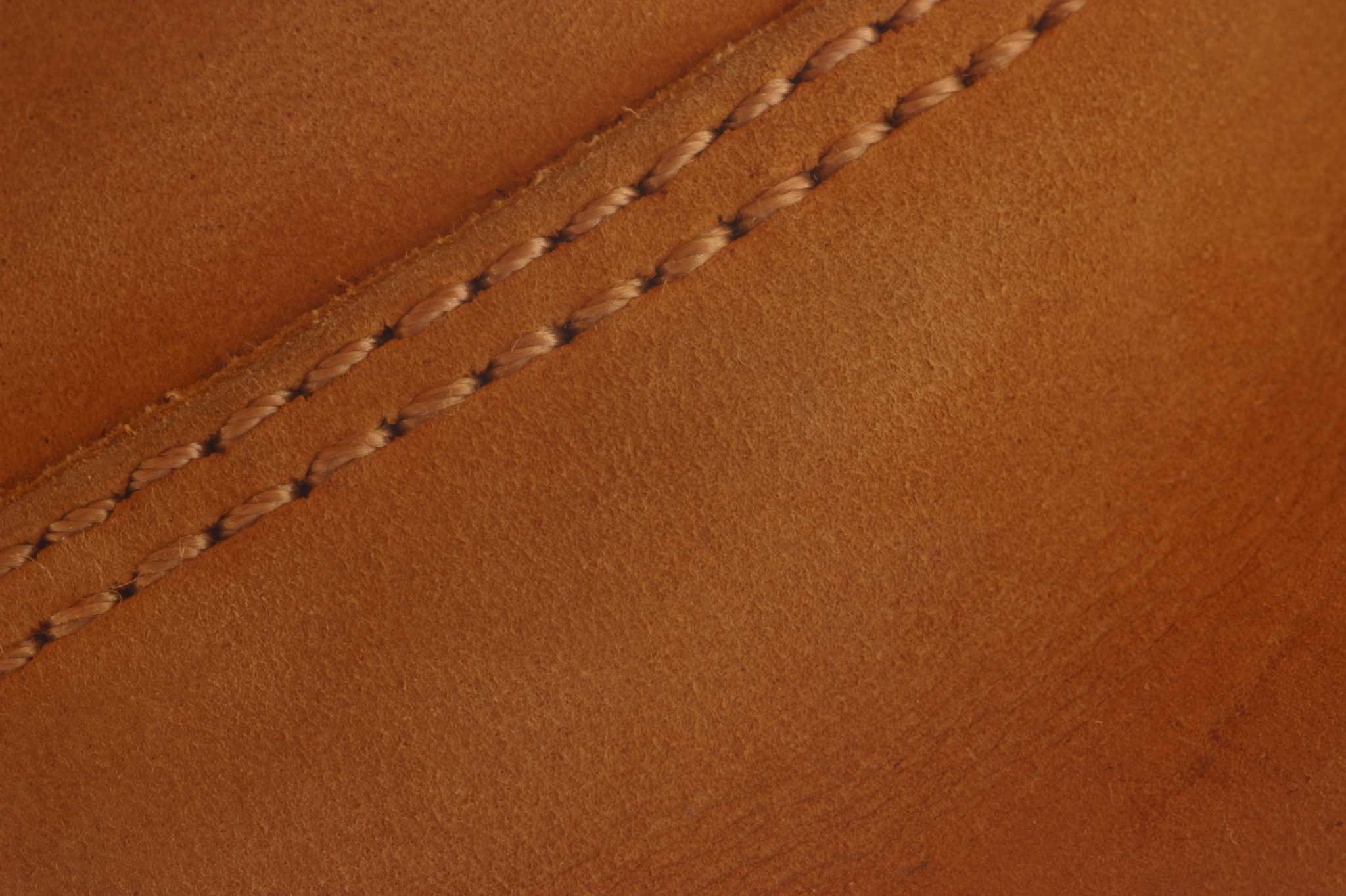 Kathleen repaired her leather with sandpaper and super glue (free