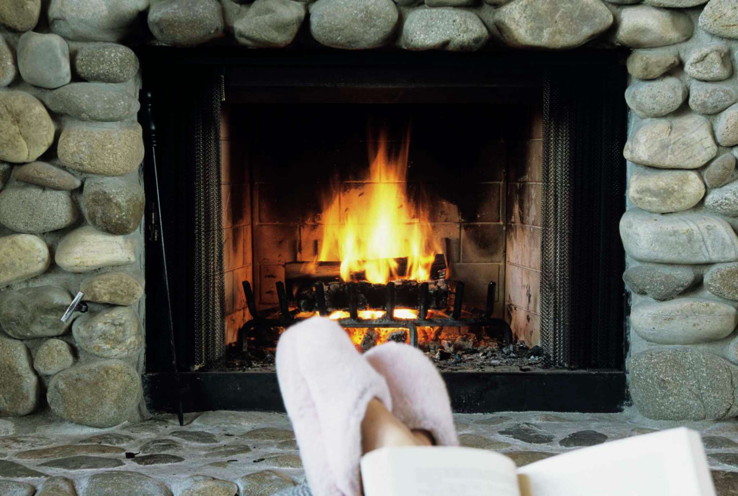 How to Keep Glass From Sooting Up on a Propane Fireplace