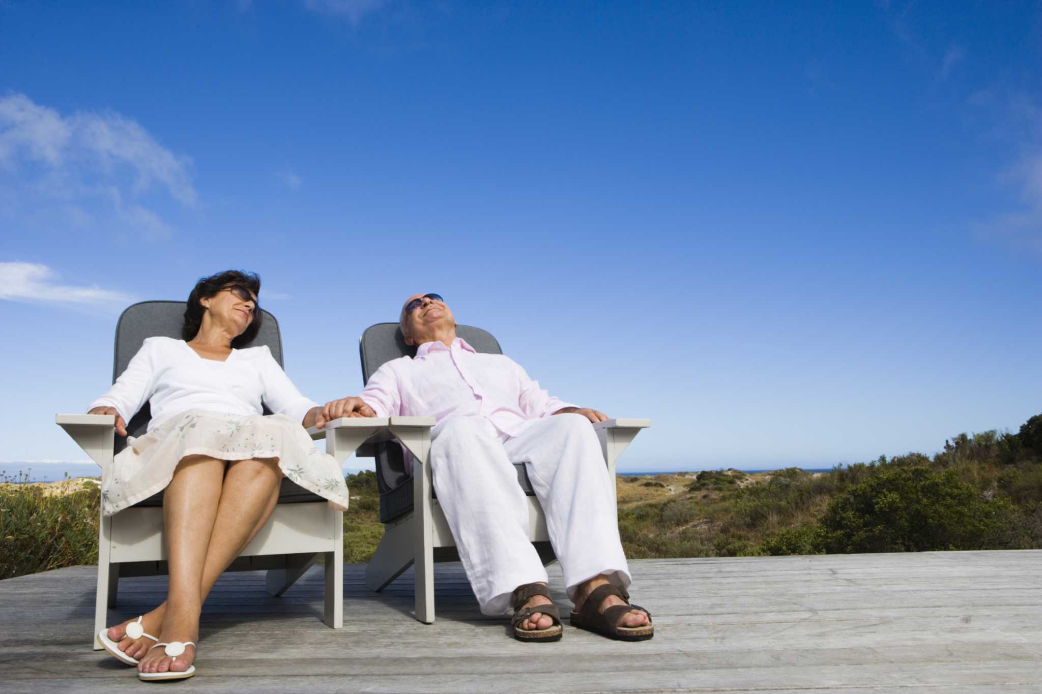 How to Keep Grass from Growing Up Underneath My Deck