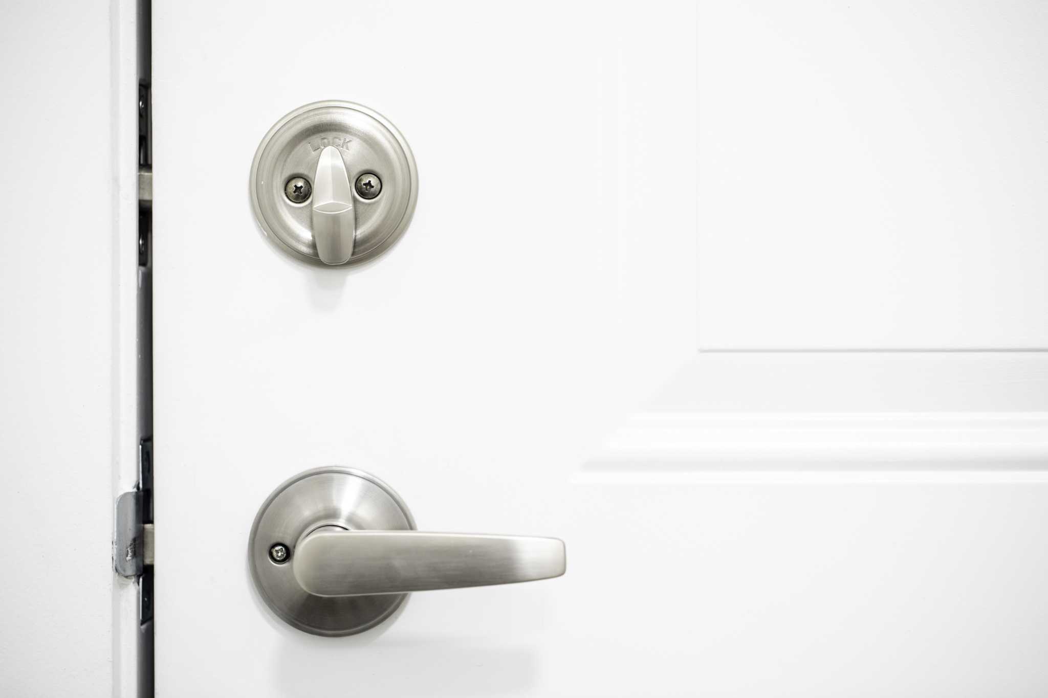 How to Replace a Deadbolt That's Stuck in the Frame