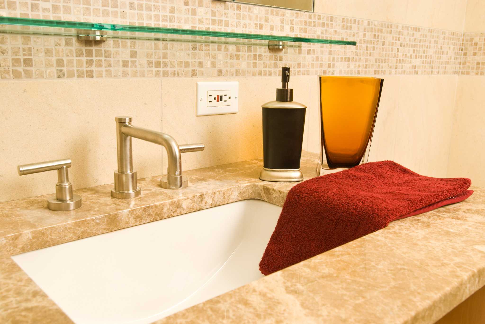 No Space Around The Sink For A Towel Bar? Here's Your Solution