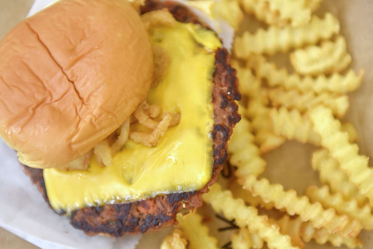 The Veggie Shack, Shake Shack's new veggie burger, comes with American cheese, crispy fried onions and pickles.