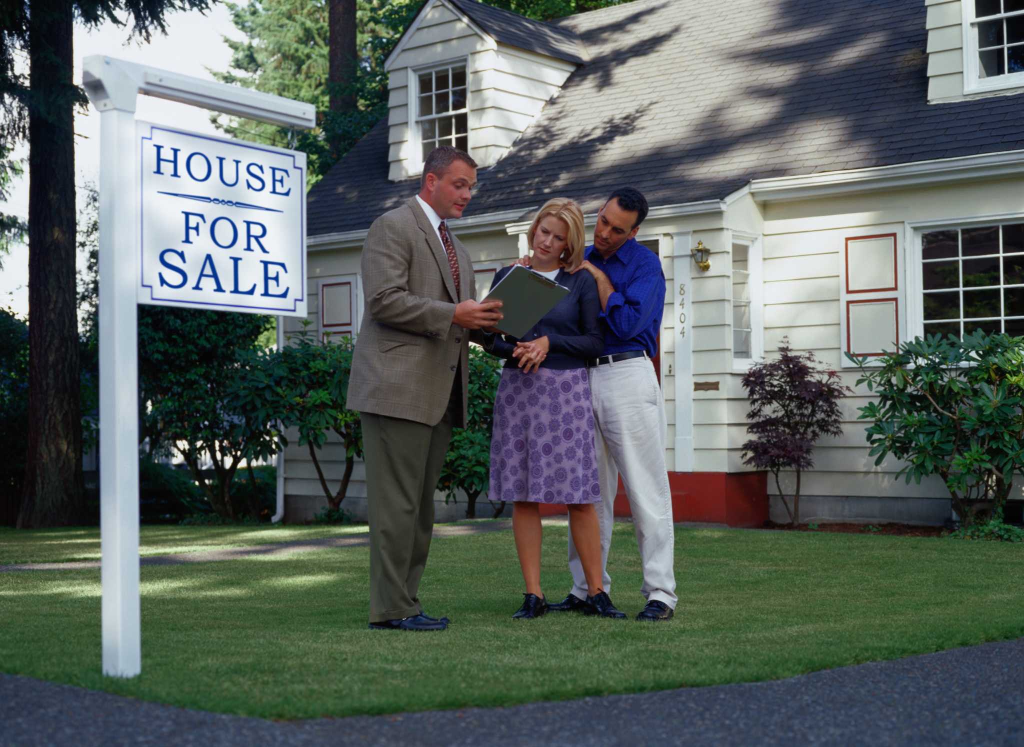 How Do I Transfer Real Estate Property Into Someone Else's Name?