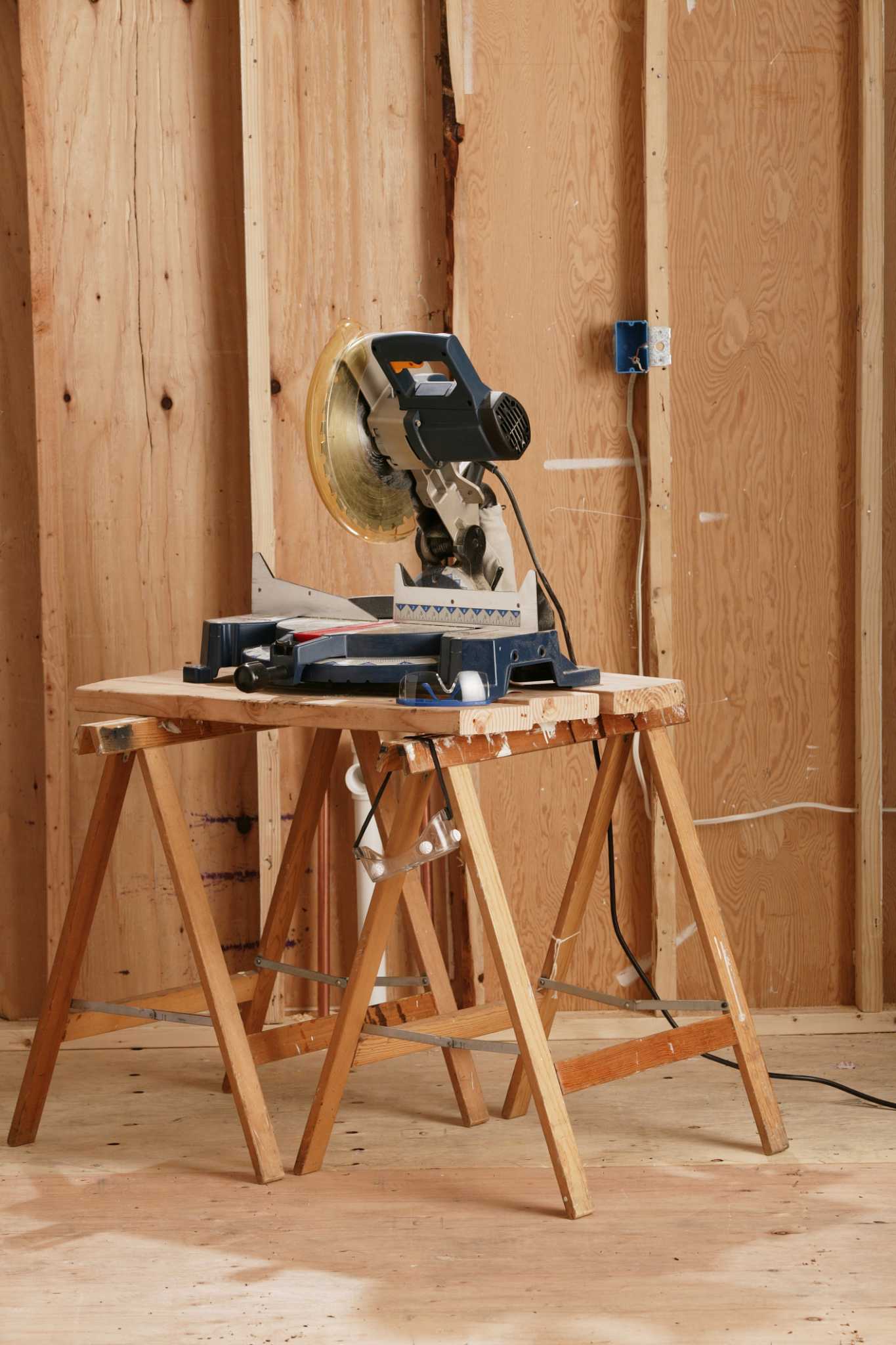 What Type of Saw is Used to Cut the Baseboards When Putting Down a Wood