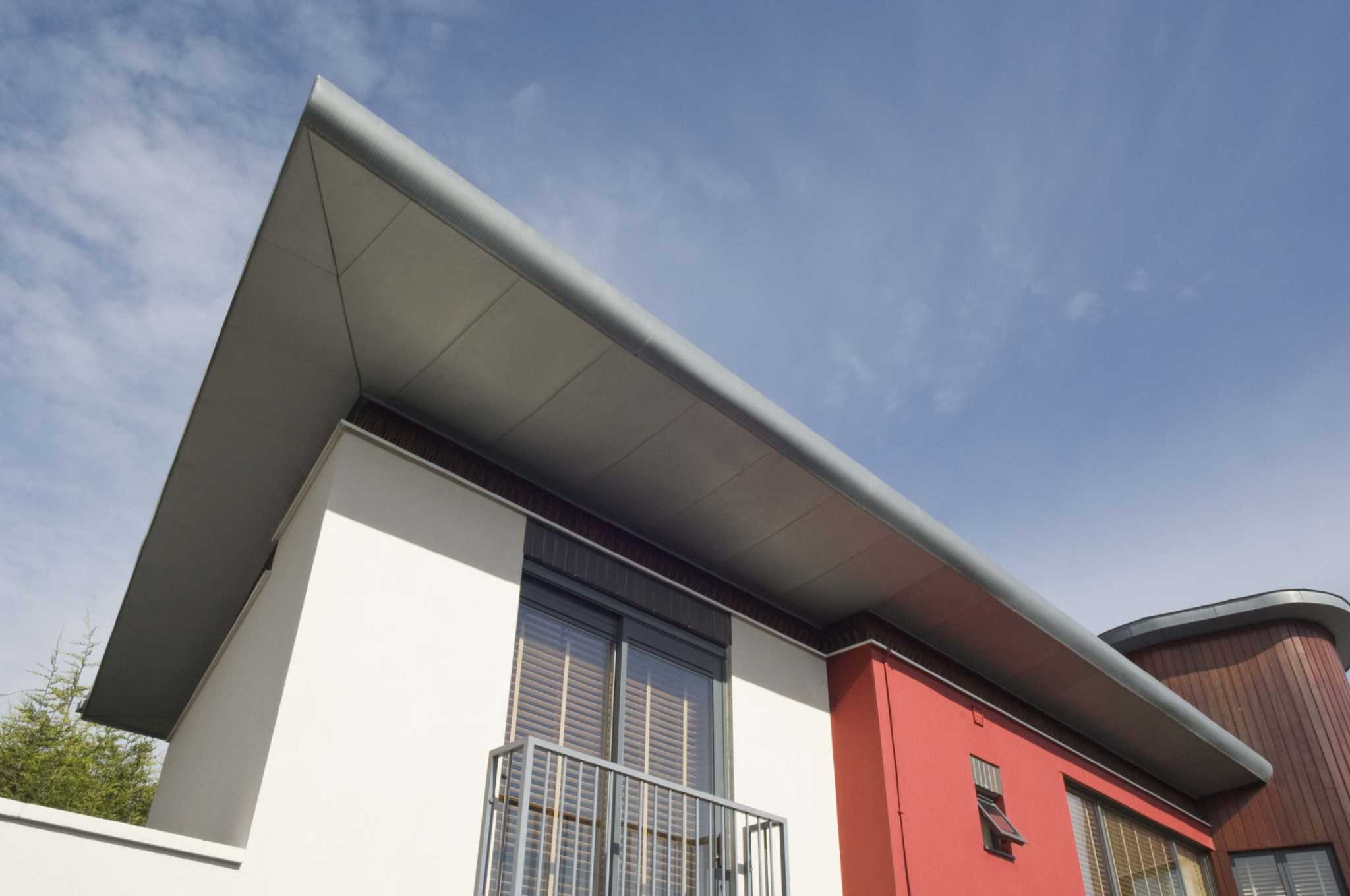 How to Prevent Flat Roof Drains From Clogging