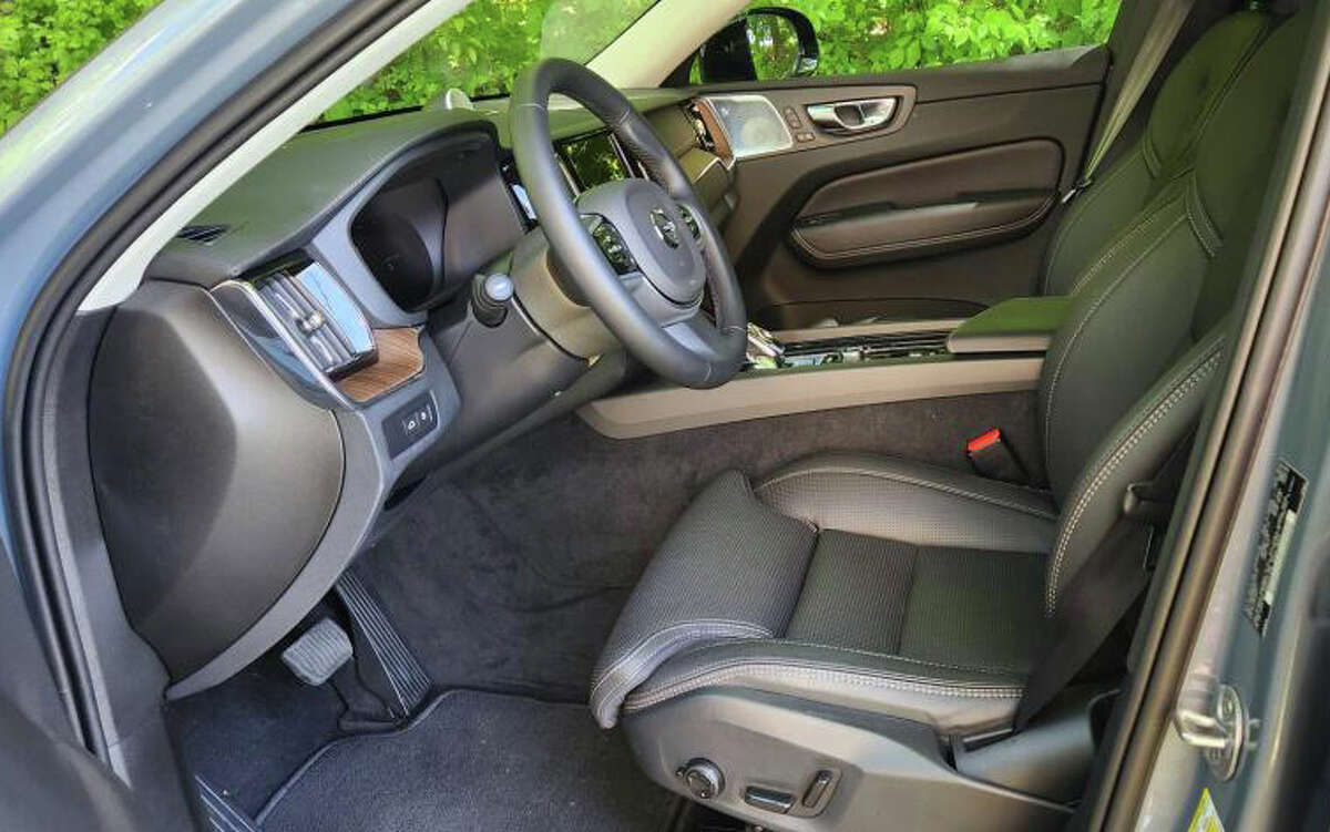 The 2023 Volvo XC60 Recharge AWD Ultimate comes with Nappa leather upholstery and wood interior inlays.