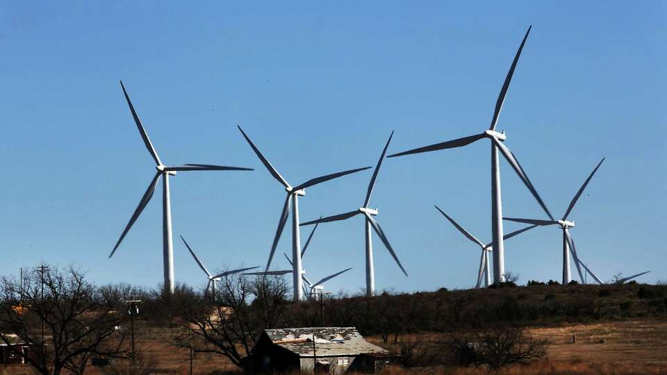 Wind turbines are viewed at a wind farm in Colorado City, Texas, in 2016. Wind power in the nation’s central corridor has been a financial windfall for some struggling rural areas.