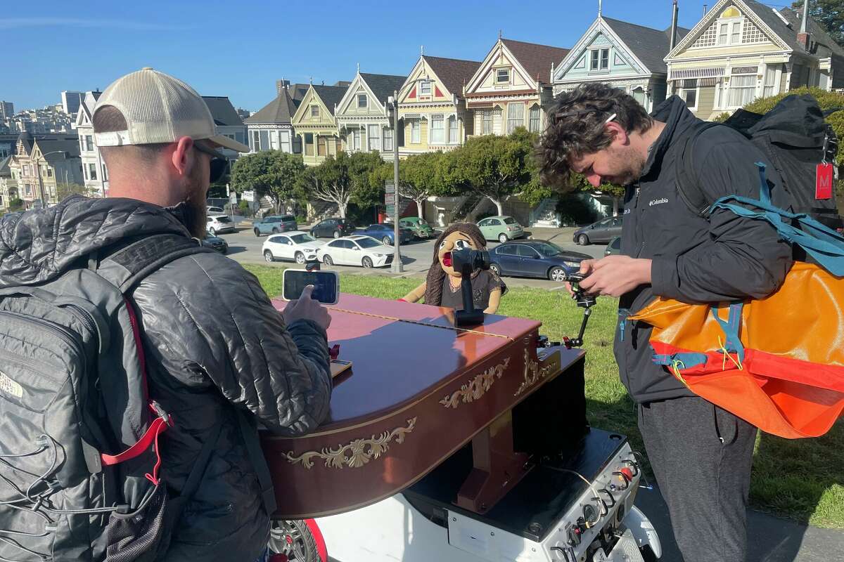 Ben Howard and Noah Klugman film a video at San Francisco's Alamo Square Park.