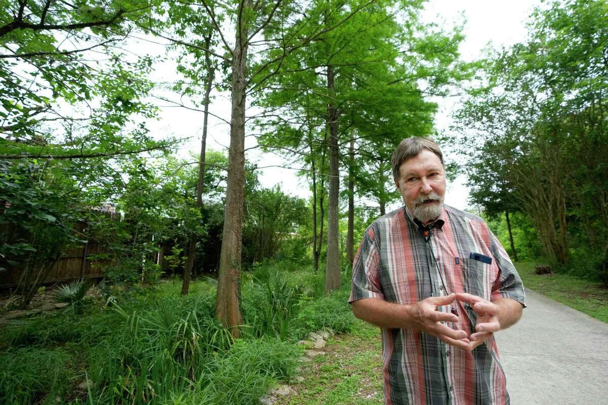 Story photo for CenterPoint sparks uproar by cutting trees it promised not to at Third Ward AIDS memorial