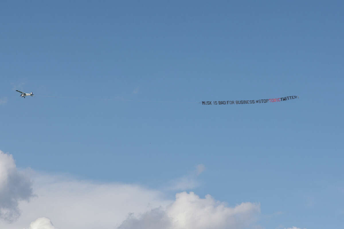 The #StopToxicTwitter coalition flies a banner urging brands not to advertise on Twitter over the Fontainebleau Hotel on April 17, 2023, in Miami Beach, Fla.