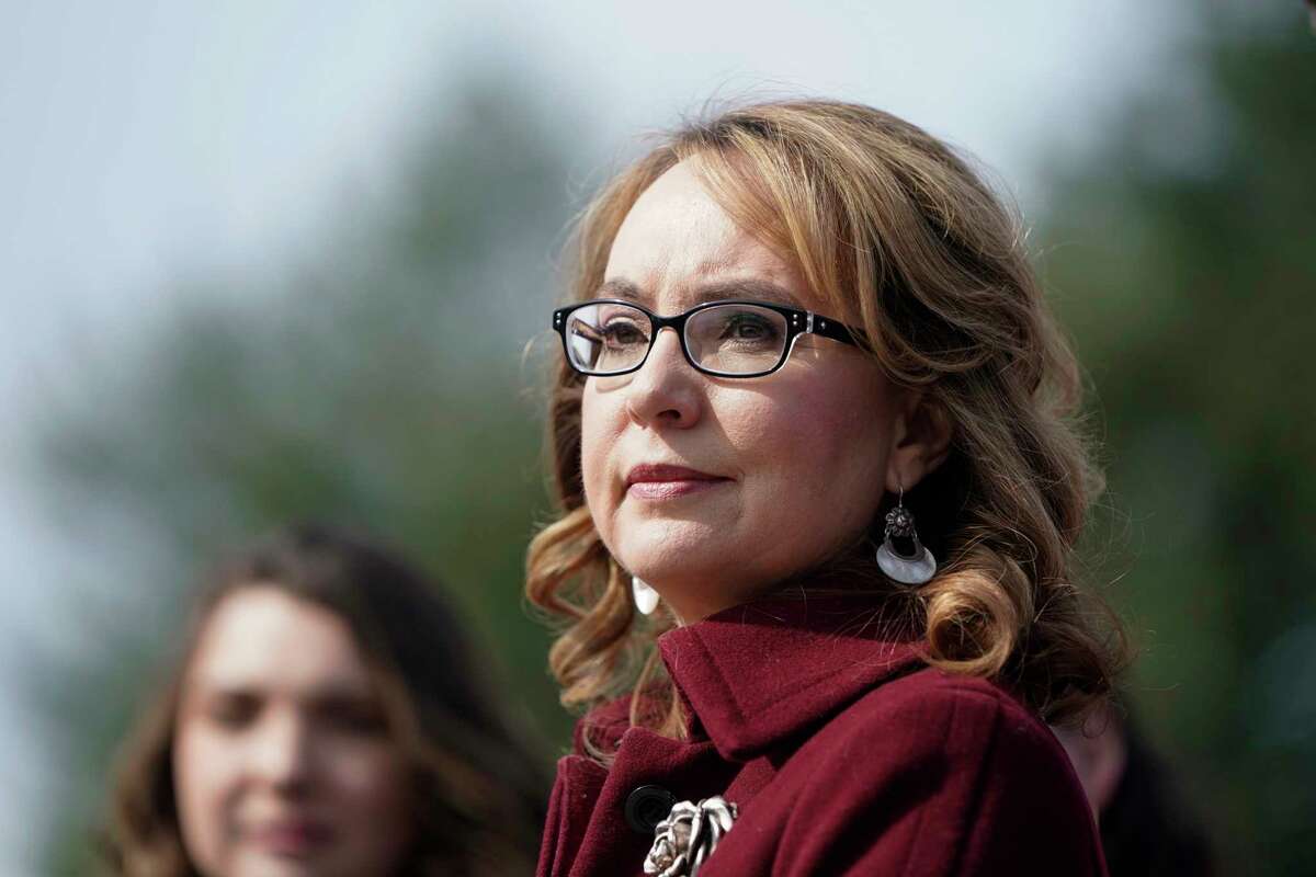 WASHINGTON, DC - FEBRUARY 26: Former Rep. Gabby Giffords (D-AZ) listens as Democratic lawmakers speak in support gun background checks legislation bill H.R. 8 on Capitol Hill on February 26, 2019 in Washington, DC.