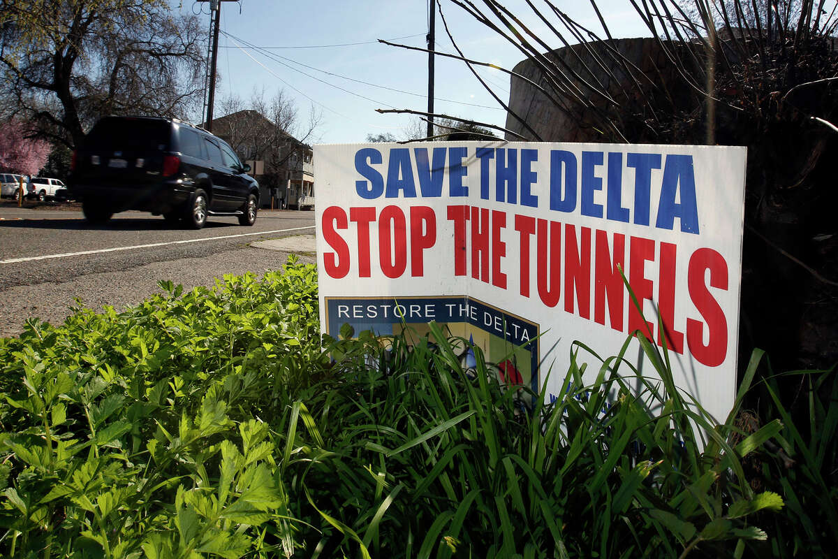 FILE: A sign opposing a proposed tunnel plan to move water through the Sacramento-San Joaquin Delta to Southern California is displayed in the Sacramento Delta region.