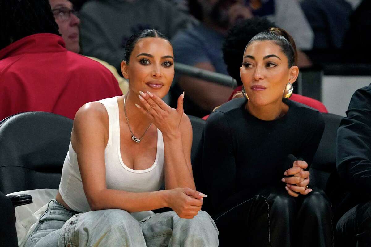 Celebrity Kim Kardashian, left, watches during the second half in Game 3 of an NBA basketball Western Conference semifinal between the Los Angeles Lakers and the Golden State Warriors Saturday, May 6, 2023, in Los Angeles. (AP Photo/Mark J. Terrill)