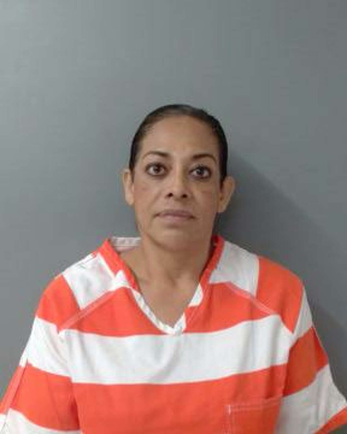 Adriana Lopez, 53, was arrested on Wednesday, May 3, 2023 in Laredo for allegedly breaking 26 slot machines with a sledgehammer and setting her husband's clothing on fire leading to damage to their residence.