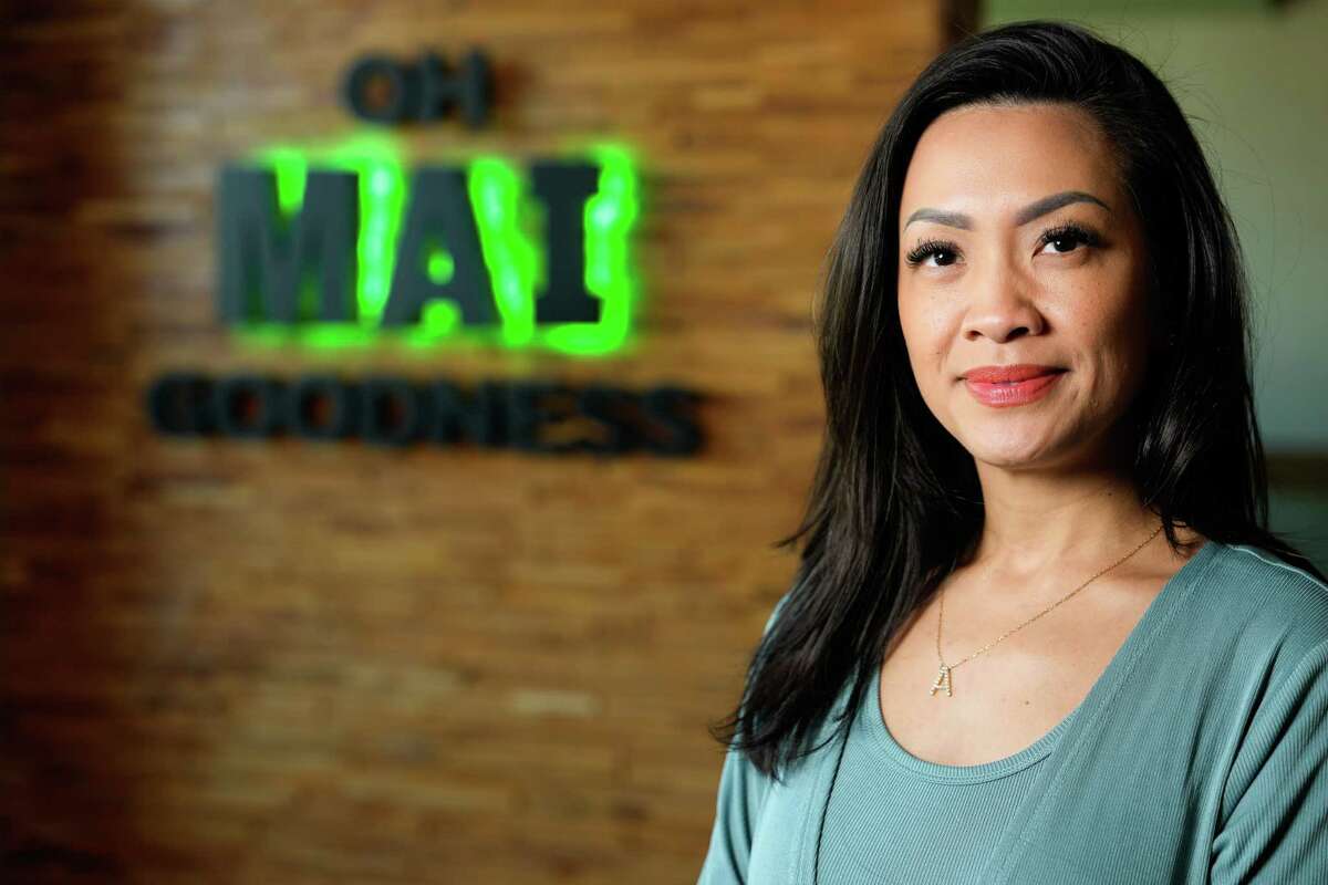 Mai’s Restaurant General Manager Anna Pham, 41, poses for a photograph at the restaurant Sunday, April 30, 2023, in Houston. Pham’s grandparents, Phin and Phac Nguyen, opened the 24-hour pool hall in 1978 and then changed it to a 24-hour full-service restaurant.