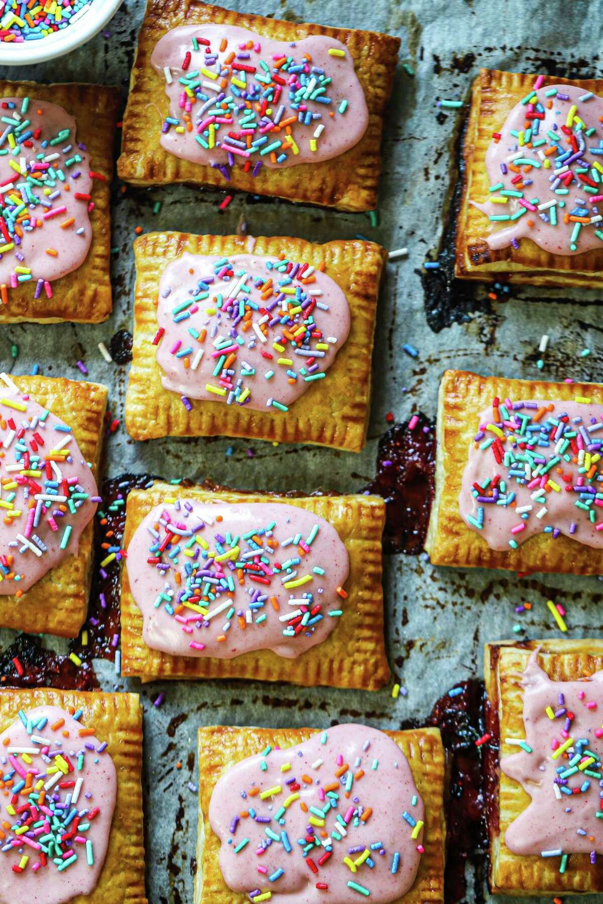Consider the strawberry icing and sprinkles optional. You could also sprinkle turbinado sugar on the egg wash instead.