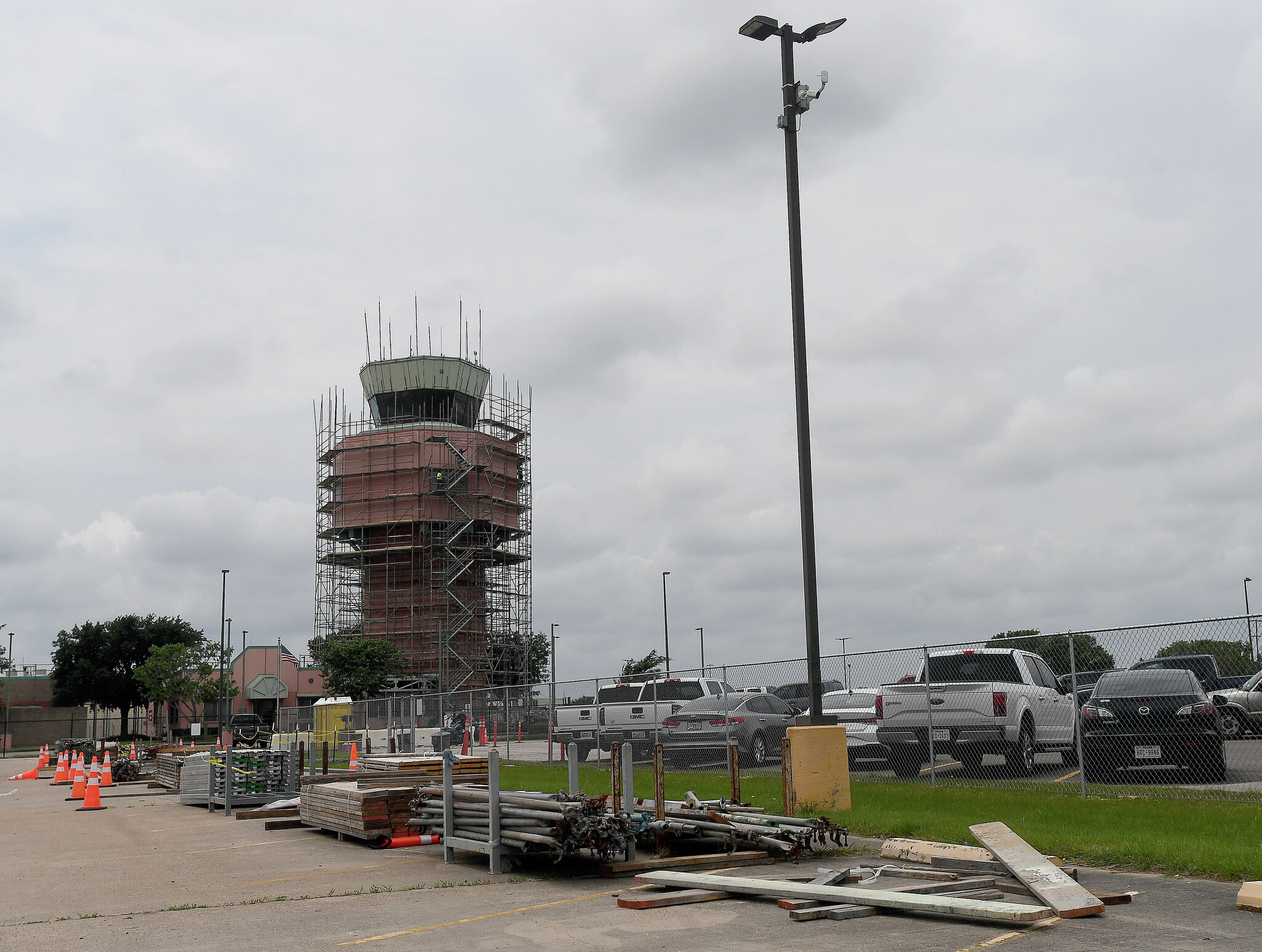 Scaffolding covers Jack Brooks air control tower for renovations