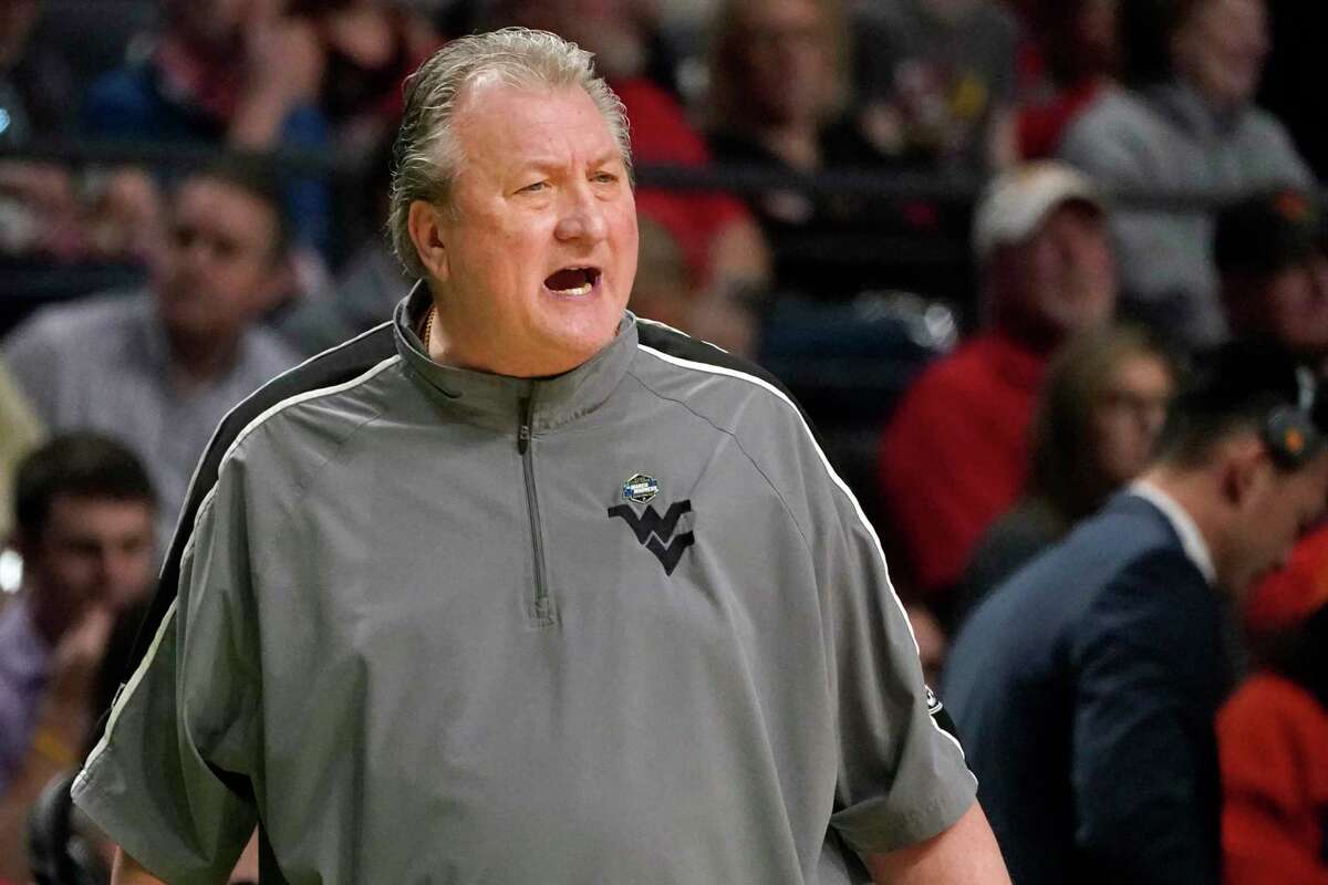 FILE - West Virginia head coach Bob Huggins calls to his players in the second half of a first-round college basketball game against Maryland in the NCAA Tournament in Birmingham, Ala., March 16, 2023. Huggins apologized Monday, May 8, 2023, after using a homophobic slur to refer to Xavier fans during a radio interview.