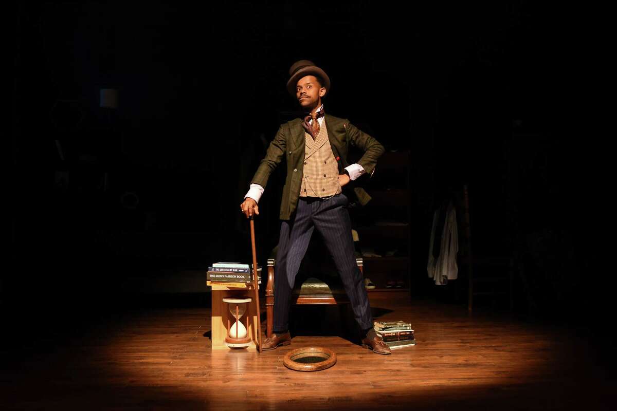 Michael Wayne Turner III, star of solo show “Hat Matter: Thoughts of a Black Mad Hatter,” poses for a portrait May 11, 2022, at Oakland Theater Project at Flax in Oakland.