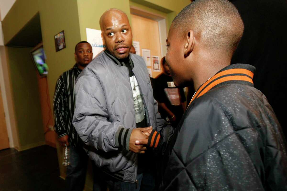 Rapper Too Short greets fans at the Youth Uprising holiday party on Dec. 21, 2006, in Oakland.