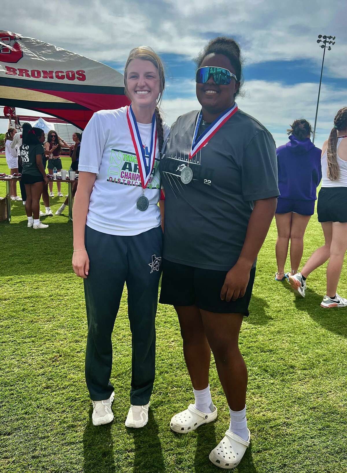 Forsan senior Aleena Nelson, right, who is pictured next to teammate Kaeli Woodall, has qualified for the UIL Class 2A Track and Field State Championships for the third straight year in the girls shot put. 