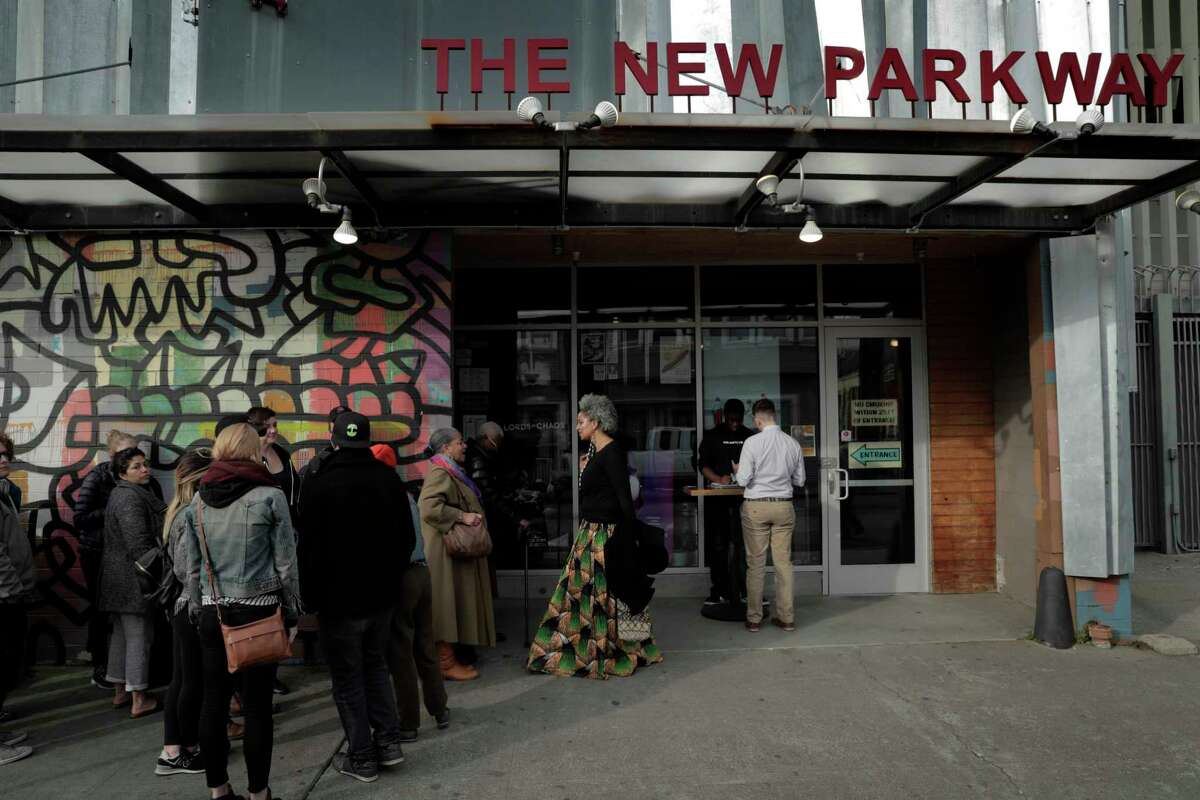 Guests wait to enter the Feb. 24, 2019, Oscar Night Party at the New Parkway Theater in Oakland.